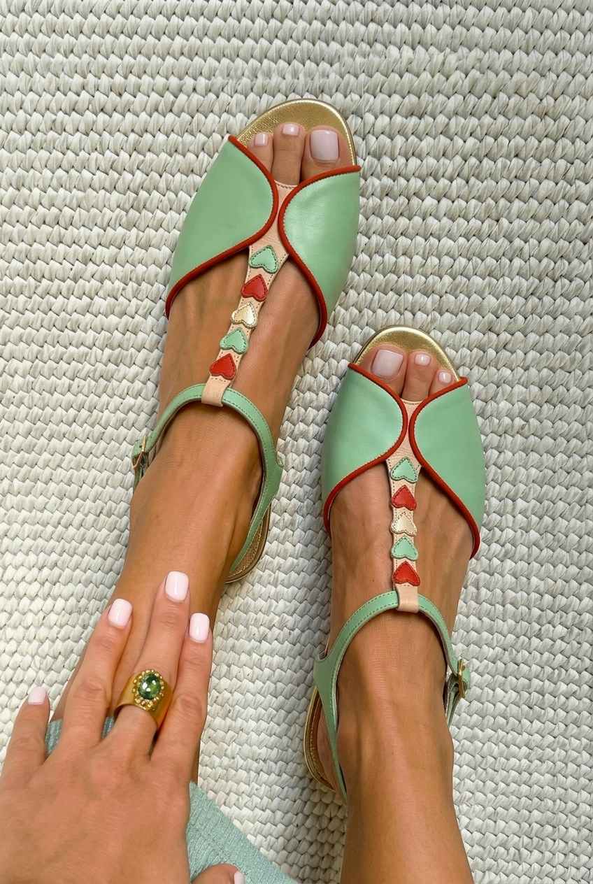 Low peep toe slingback sandals with heart detail